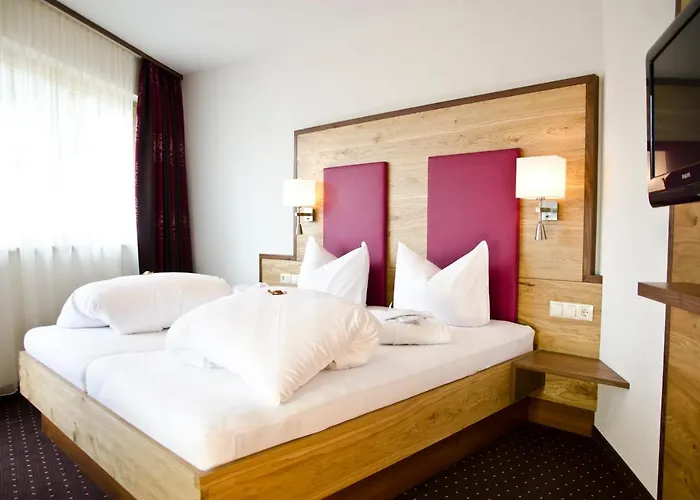 Garni Arosa Hotell 4*