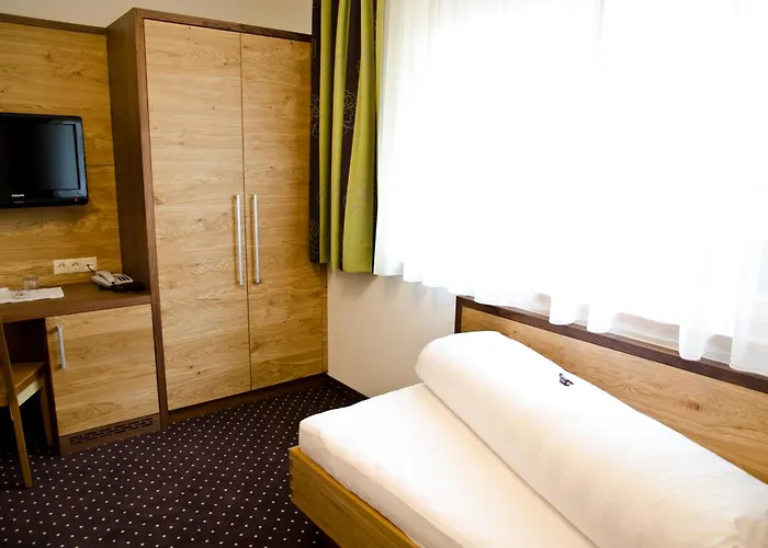 מלון Garni Arosa 4*